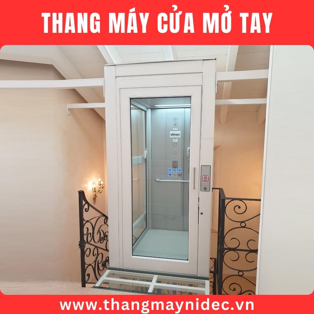 thang máy thủy lực cửa mở tay