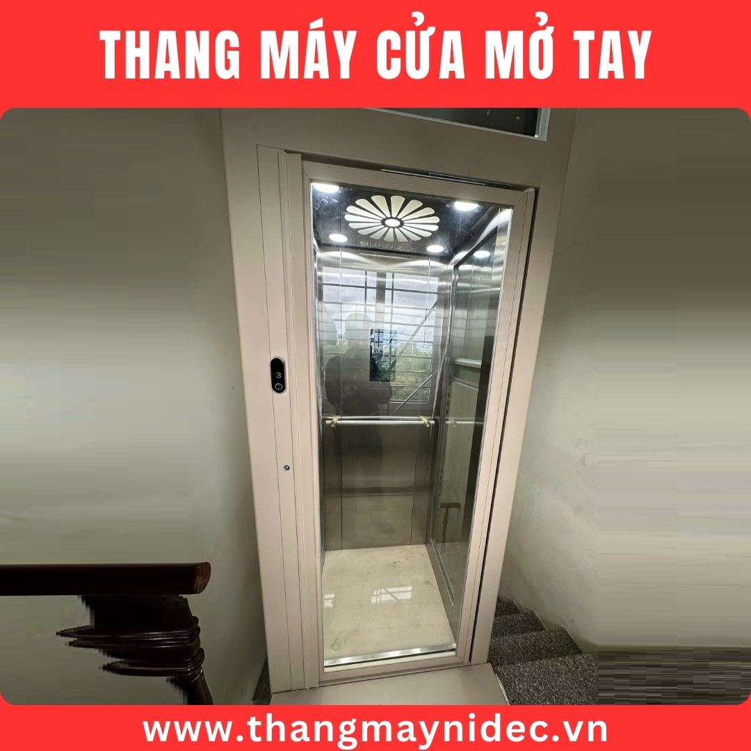 thang máy cửa mở tay tự đóng