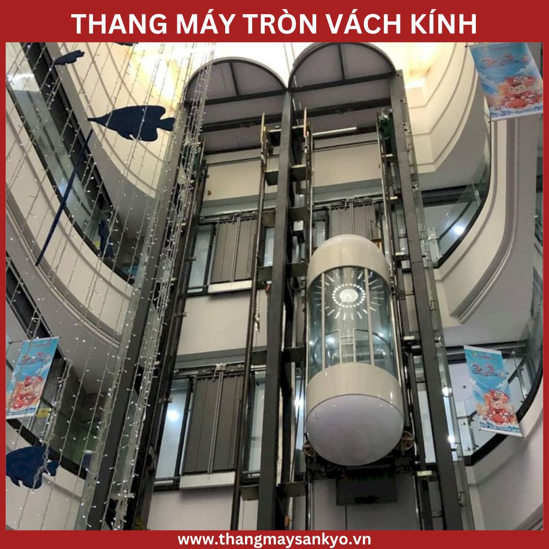 Thang máy vách kính tròn ở trung tâm thương mại Thang máy vách kính tròn ở trung tâm thương mại